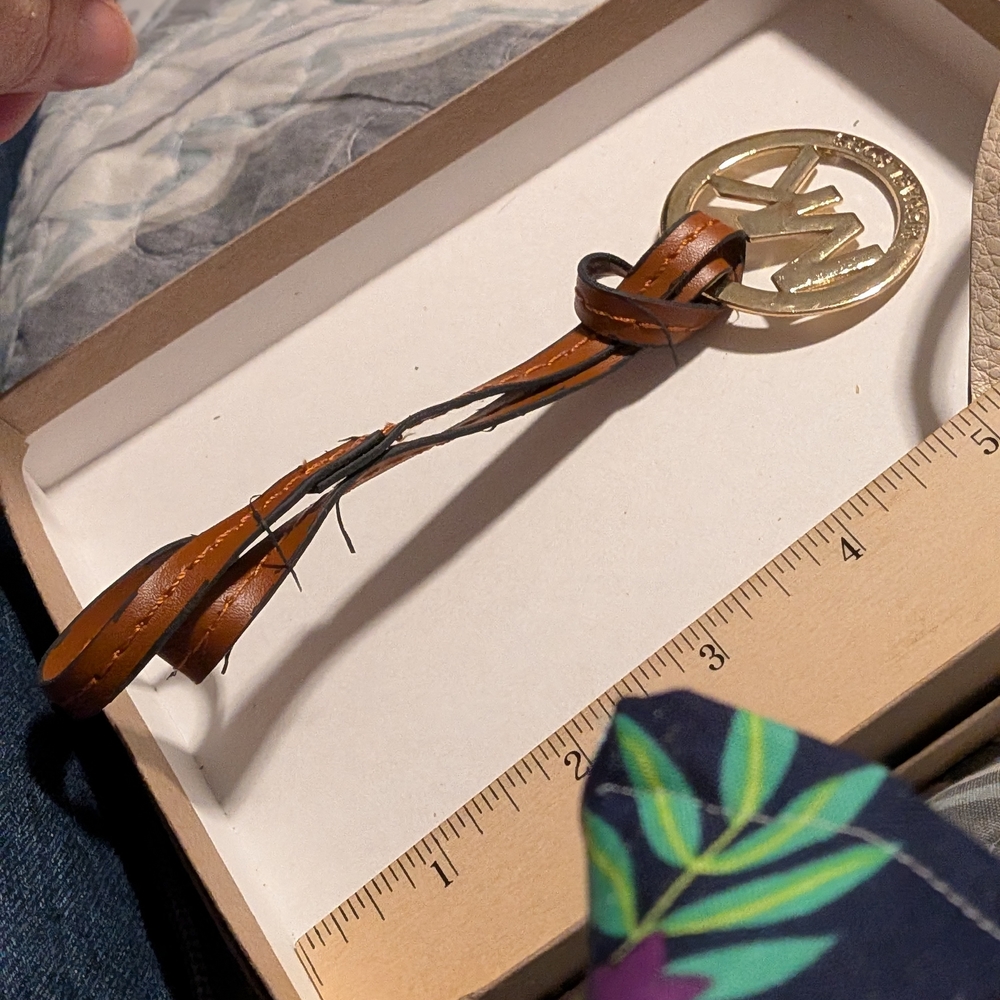 Brown Leather Keychain with Gold Emblem